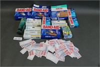 assorted Band-Aids and ointments