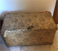 Antique upholstered trunk, contents included