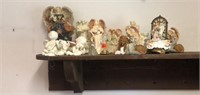 Shelf of angel figurines, (shelf not included)