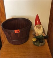 Plastic garden gnome, basket