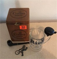 Cigar box, wooden pipe, beer glass, key chain