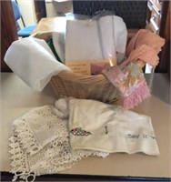 Basket of linens, vintage tablecloths