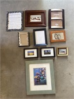 Lot of picture frames, coat hangers and house