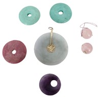 Seven Chinese Discs, Beads and a Pendant