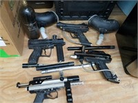 4 paintball guns w two hoppers and co2 tank