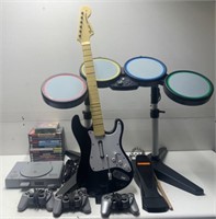 SONY PLAYSTATION PACKAGE PS1, 16 PS2 GAMES, GUITAR