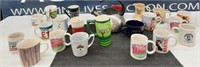 assortment of mugs and coffee cups. one tea kettle