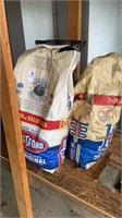3 bags of Kingsford Charcoal and a bag of lava