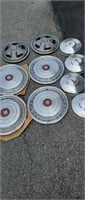 Lot of hubcaps Cadillac