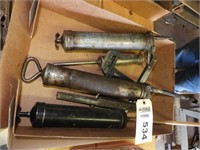 Box of grease guns