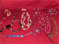 Necklaces, pins, and earrings sets