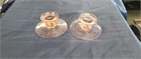 Two vintage pink depression glass candle holders