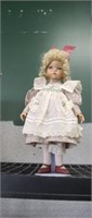 Vintage 15 in porcelain doll with stand