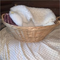 laundry basket with bath rugs