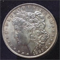 Of) 1885 better grade Morgan silver dollar
