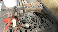 trash cart, metal cart and pallet of welding leads
