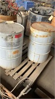 partial barrels of clear Linseed oil