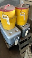 pallet of water jugs and coolers