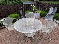 Metal table, chairs and umbrella stand