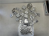 Lot of metal cookie cutters and cake decorating