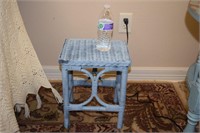 small wicker table painted blue