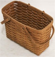 1992 Longaberger magazine basket w/ swivel handles