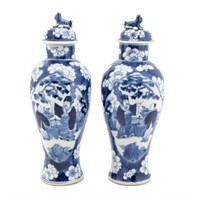 PAIR OF CHINESE BLUE AND WHITE LIDDED URNS