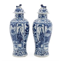 PAIR OF CHINESE BLUE AND WHITE LIDDED URNS