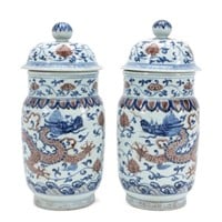 PAIR, CHINESE BLUE, WHITE, & IRON RED LIDDED URNS