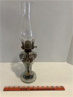 Oil lamp filled with buttons