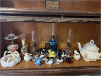 Shelf Contents. Glass Vintage Lamps, Goebel