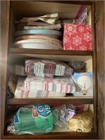 Cabinet Full of Holiday Paper Plates Napkins Etc
