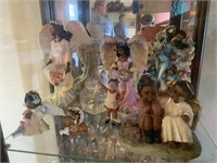 Shelf Full of 8 Decorative Figurines