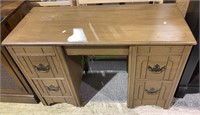 Small size vintage four-drawer kneehole desk on