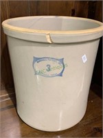 3 gallon crock with a large crack and chip at the