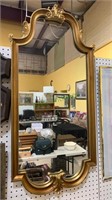 Tall gold wood wall mirror with applied