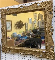 Antique fancy gold framed wall mirror, with a lot