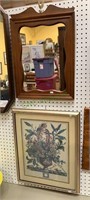 Small framed wall mirror with a eagle finial top,