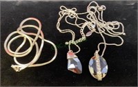 Lot of three silver toned necklaces, Chicos, two