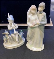 Porcelain figurines, boy and lambs made in West