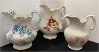 Lot of three antique Victorian style pitchers -