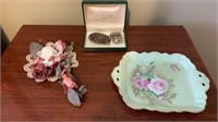 Belt Buckles, Serving Tray and Floral Decor