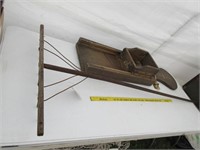 Antique rake and large cabbage cutter