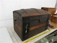 Antique dome top trunk with tray insert