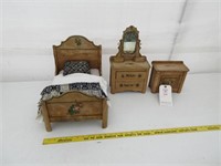Antique three-piece doll bed with dressers