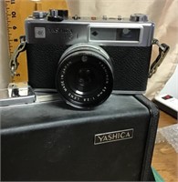Yashica MG-1 camera with case and lenses