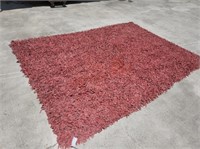 Leather shag rug coral