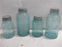 Four Vtg Blue Glass Ball Jars W/Lids Tallest 9.5"
