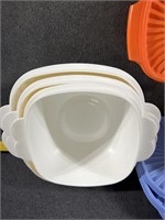 Tupperware Bowls (4) and (1) Cannister