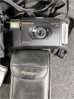 Polaroid and Olympus Cameras